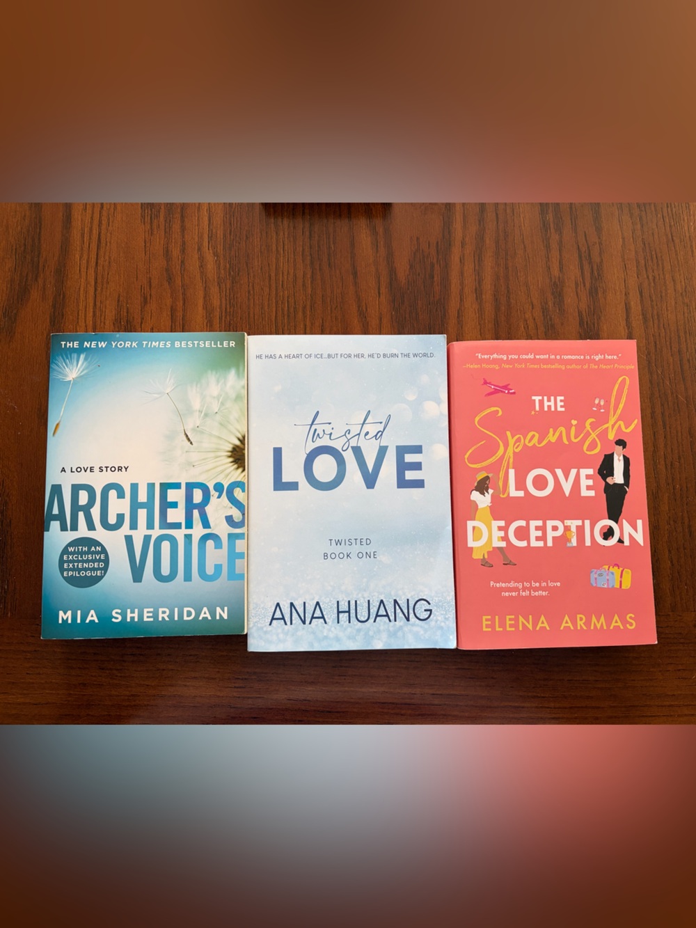 Set of three romance novels by Ana Huang, Elena Armas, and Mia Sheridan